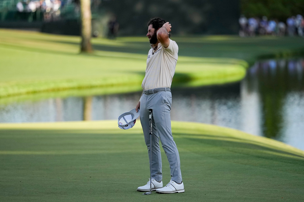 Cameron Young reacts after missing a putt on the 16th hole during the final round of the Masters golf tournament at the Augusta National Golf Club, Sunday, April 12, 2026, in Augusta, Ga. (AP Photo/Gerald Herbert)