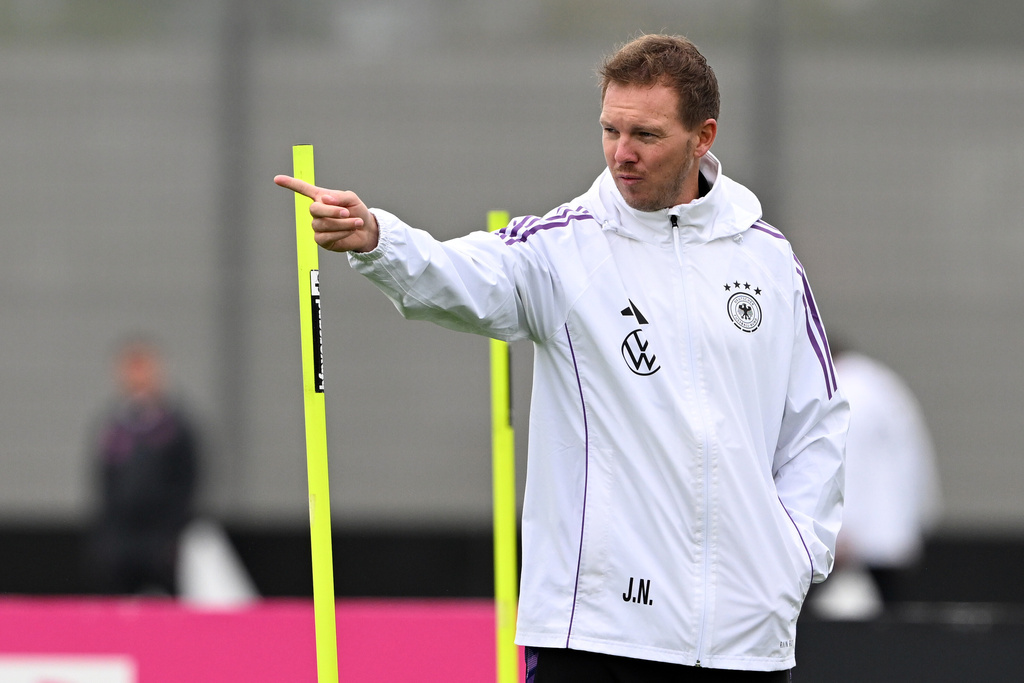Germany's head coach Julian Nagelsmann gives instructions during training session of the German national soccer team in Herzogenaurach, Germany, Tuesday, Oct. 7, 2025, ahead of the World Cup qualifier soccer match against Luxembourg. (Federico Gambarini/dpa via AP)