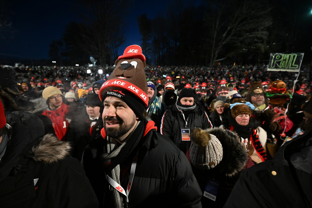 A crowd waits for Punxsutawney Phil, the weather prognosticating groundhog, to come out and make his prediction during the 140th celebration of Groundhog Day on Gobbler's Knob in Punxsutawney, Pa., Monday, Feb. 2, 2026. (AP Photo/Barry Reeger)