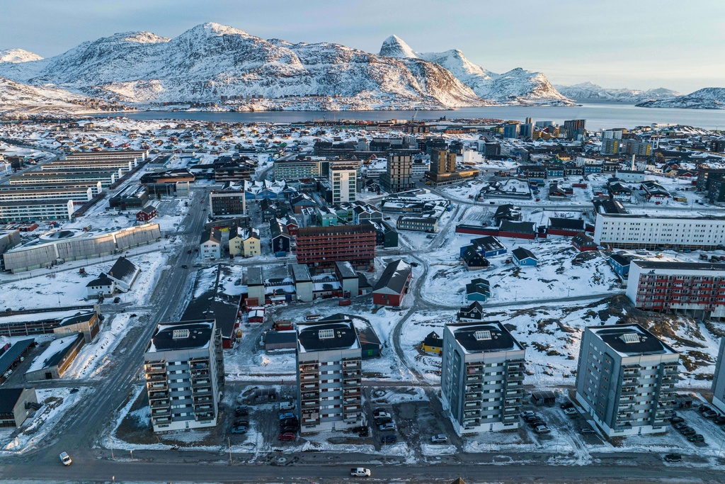 Houses are seen in Nuuk, Greenland, on Sunday, Jan. 25, 2026. (AP Photo/Evgeniy Maloletka)