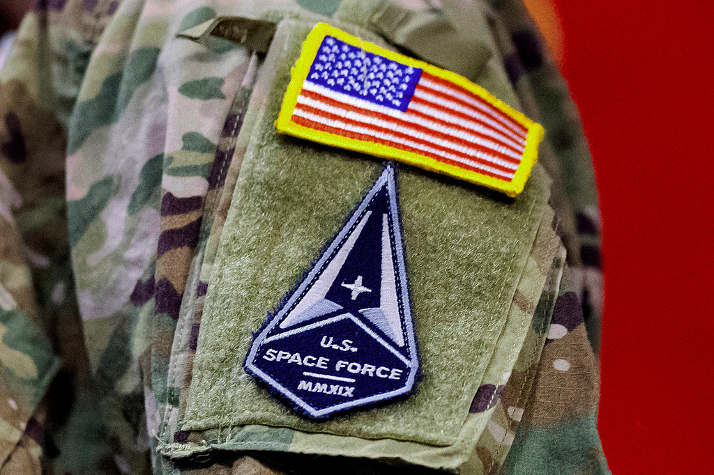 FILE - A solider wears a U.S. Space Force uniform during a ceremony for U.S. Air Force airmen transitioning to U.S. Space Force guardian designations at Travis Air Force Base, Calif., Feb. 12, 2021. (AP Photo/Noah Berger, File)