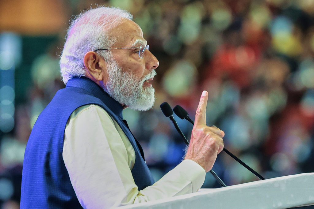 In this photo provided by Indian Prime Minister's Office, India Prime Minister Narendra Modi speaks during the AI Summit in New Delhi, India, Thursday, Feb. 19, 2026. (Indian Prime Minister's Office via AP)