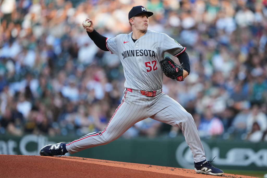 Minnesota Twins starting pitcher Zebby Matthews throws against the Seattle Mariners during the first inning of a baseball game, Friday, July 31, 2026, in Seattle. (AP Photo/Lindsey Wasson)