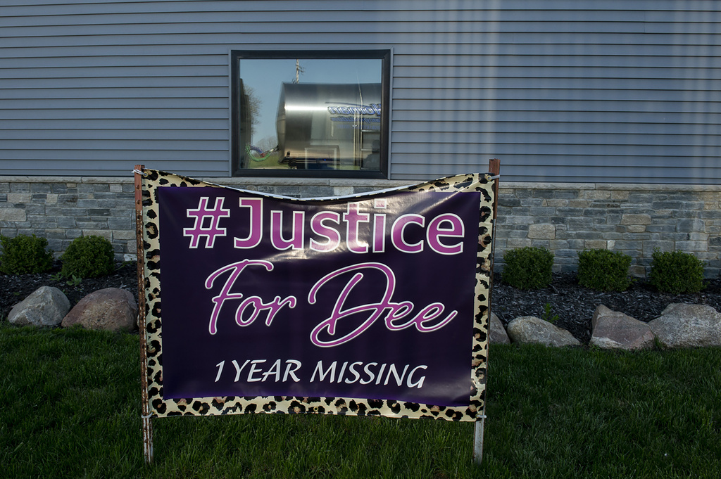 A banner calls for justice in the case of missing woman Dee Warner in Tipton, Mich. on Monday, May 9, 2022. (Jacob Hamilton/Jackson Citizen Patriot via AP)