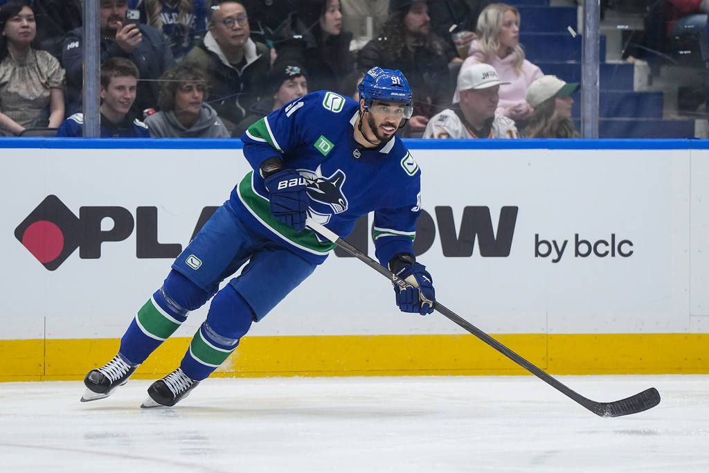 Vancouver Canucks' Evander Kane skates during the second period of an NHL hockey game against the San Jose Sharks in Vancouver, British Columbia, Tuesday, Jan. 27, 2026. (Darryl Dyck/The Canadian Press via AP)