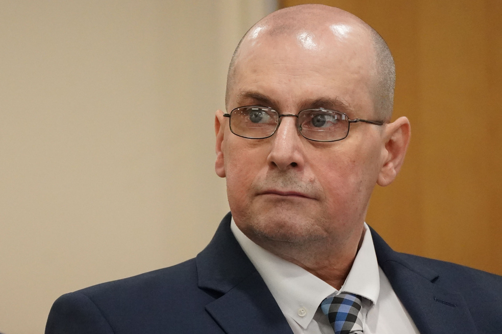 FILE - Brian Scott Lorenz, right, sits with his defense attorney Ilann Maazel, left, in court in Buffalo, N.Y., April 22, 2026, before closing arguments in his second retrial for the 1993 killing of Deborah Meindl. (Derek Gee/The Buffalo News via AP, File)