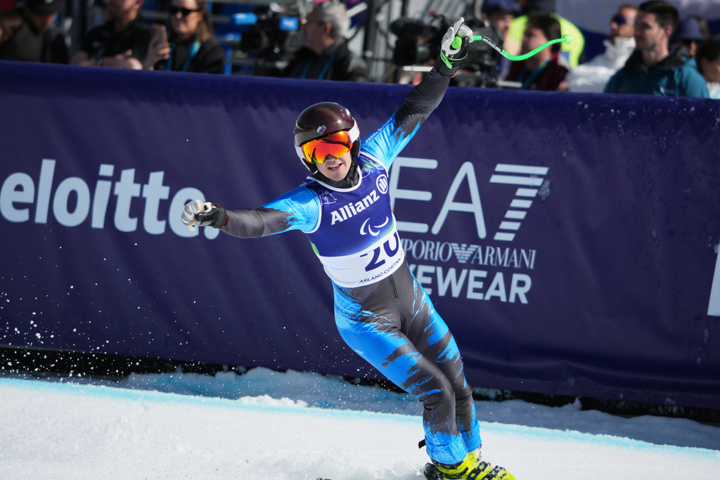 Aleksei Bugaev, of Russia, reacts after competing in the alpine skiing men's downhill standing competition at the 2026 Winter Paralympics, in Cortina d'Ampezzo, Italy, Saturday, March 7, 2026. (AP Photo/Emilio Morenatti)