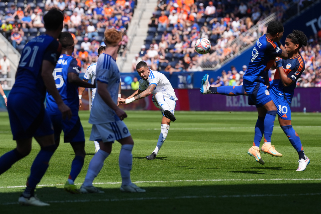 CF Montréal midfielder Iván Jaime, center, takes a free kick during the first half of an MLS soccer match against FC Cincinnati, Sunday, March 22, 2026, in Cincinnati. (AP Photo/Kareem Elgazzar)