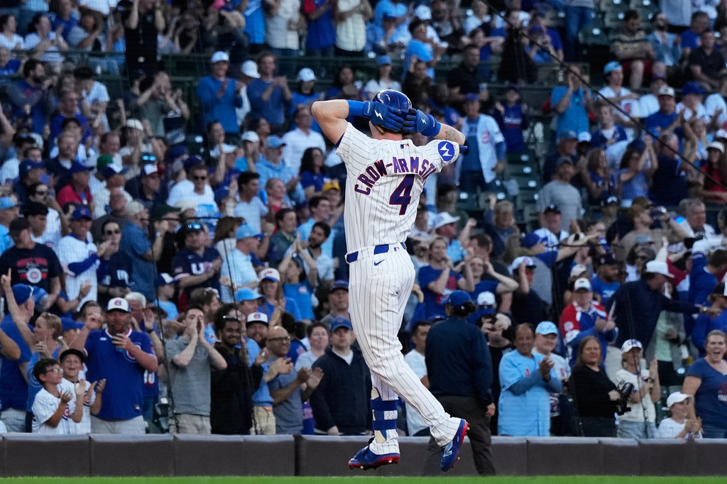 Chicago Cubs' Pete Crow-Armstrong reacts as he rounds the bases after hitting a solo home run during the first inning of a baseball game against the Colorado Rockies in Chicago, Monday, June 15, 2026. (AP Photo/Nam Y. Huh)