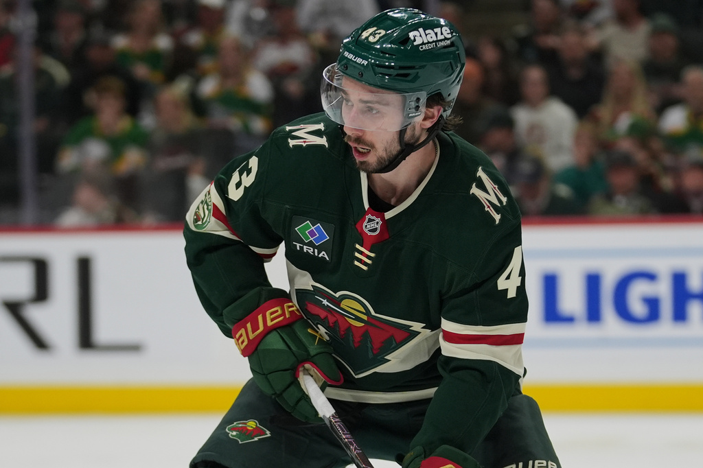 FILE - Minnesota Wild defenseman Quinn Hughes (43) skates with the puck during the second period of Game 3 of an NHL Stanley Cup hockey second-round playoff series against the Colorado Avalanche Saturday, May 9, 2026, in St. Paul, Minn. (AP Photo/Abbie Parr, File)
