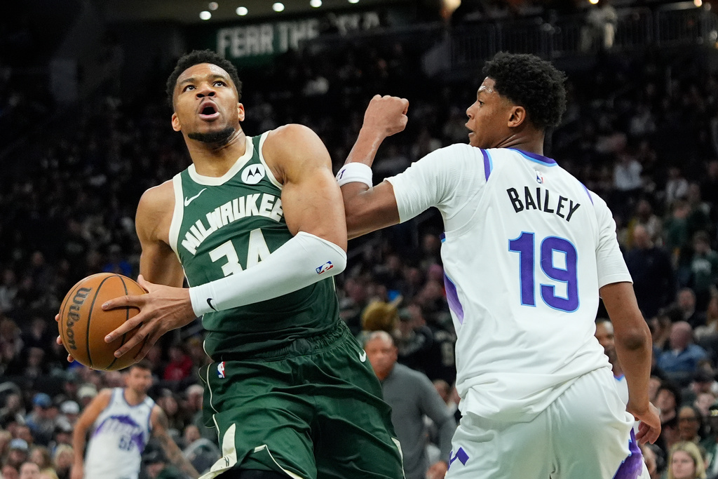Milwaukee Bucks' Giannis Antetokounmpo (34) drives to the basket against Utah Jazz's Ace Bailey (19) during the second half of an NBA basketball game Saturday, March 7, 2026, in Milwaukee. (AP Photo/Aaron Gash)