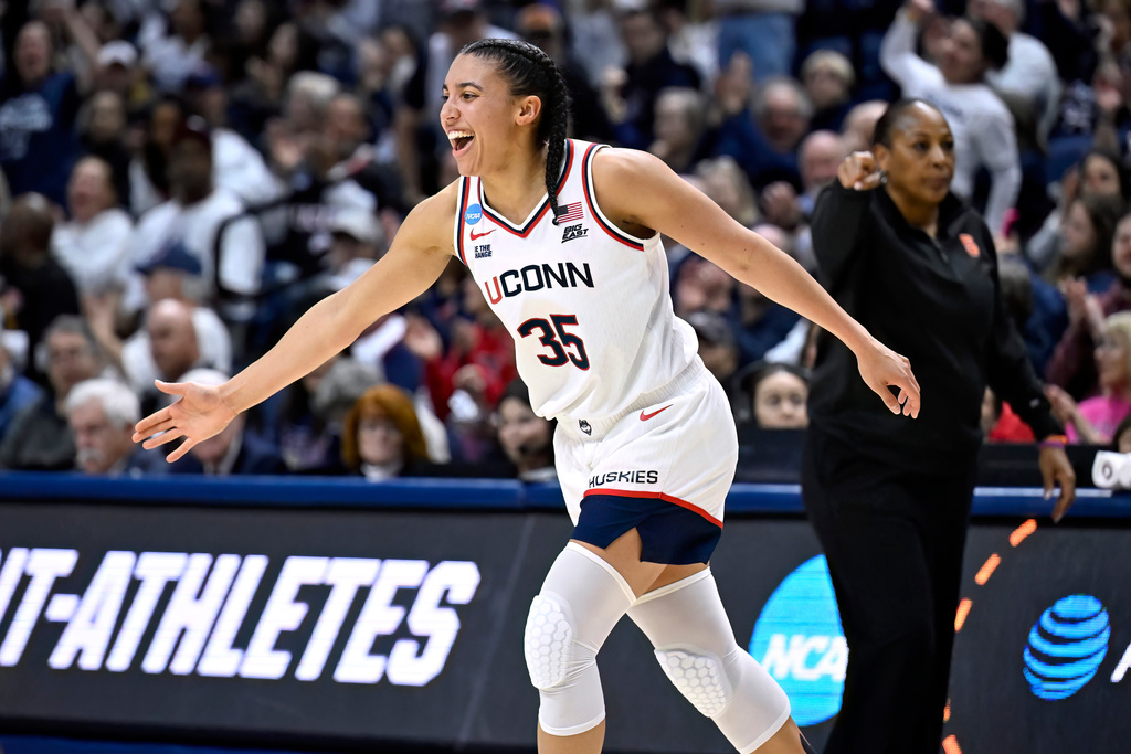 UConn guard Azzi Fudd (35) reacts after making a 3-point basket during the first half in the second round of the NCAA college basketball tournament against Syracuse, Monday, March 23, 2026, in Storrs, Conn. (AP Photo/Jessica Hill)