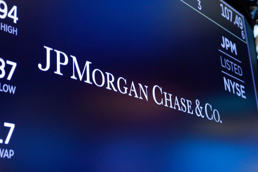 FILE - The logo for JPMorgan Chase & Co. appears above a trading post on the floor of the New York Stock Exchange in New York, Aug. 16, 2019. (AP Photo/Richard Drew, File) FILE - The logo for JPMorgan Chase & Co. appears above a trading post on the floor of the New York Stock Exchange in New York, Aug. 16, 2019. (AP Photo/Richard Drew, File)