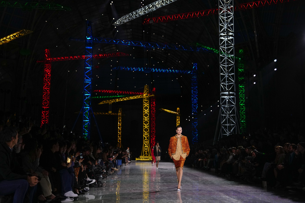 A model wears a creation as part of the Chanel Fall/Winter 2026-2027 Women's collection presented in Paris, Monday, March 9, 2026. (AP Photo/Aurelien Morissard)