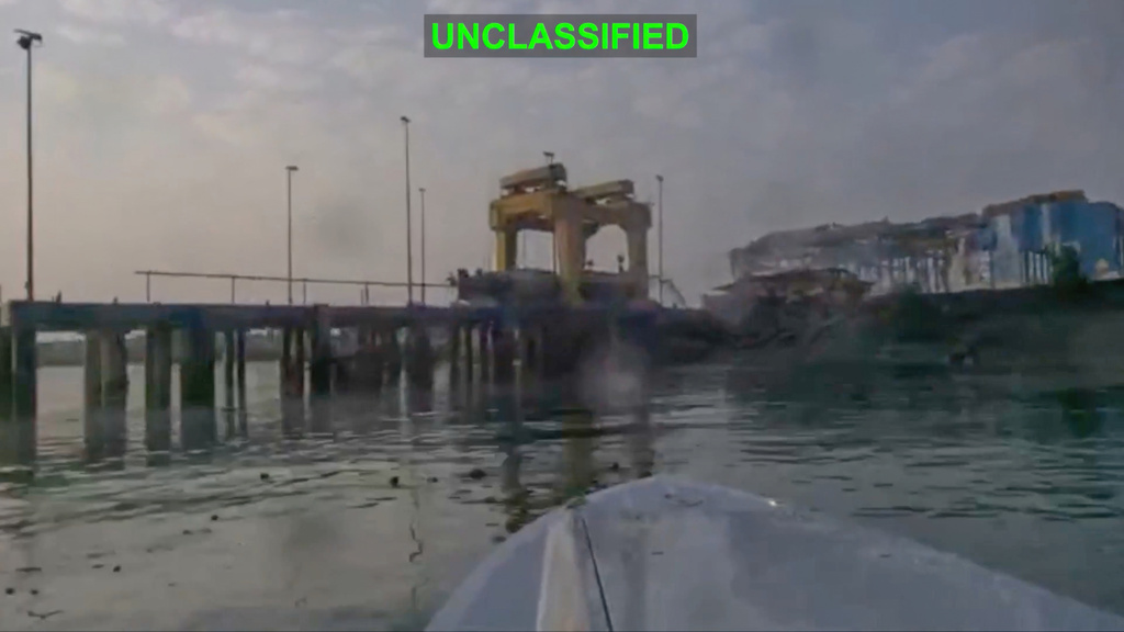 This image from video released by U.S. Central Command, shows a view from a Corsair unmanned surface vessel, also called one-way attack surface drone, fired by U.S. military, closing in on Bandar Abbas Naval Base, Iran, July 12, 2026. (U.S. Central Command via AP)