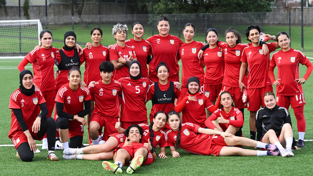 Afghan women's players pose for a team photo during a training session in Auckland, New Zealand, Tuesday, June 2, 2026. (Andrew Cornaga/Photosport via AP)