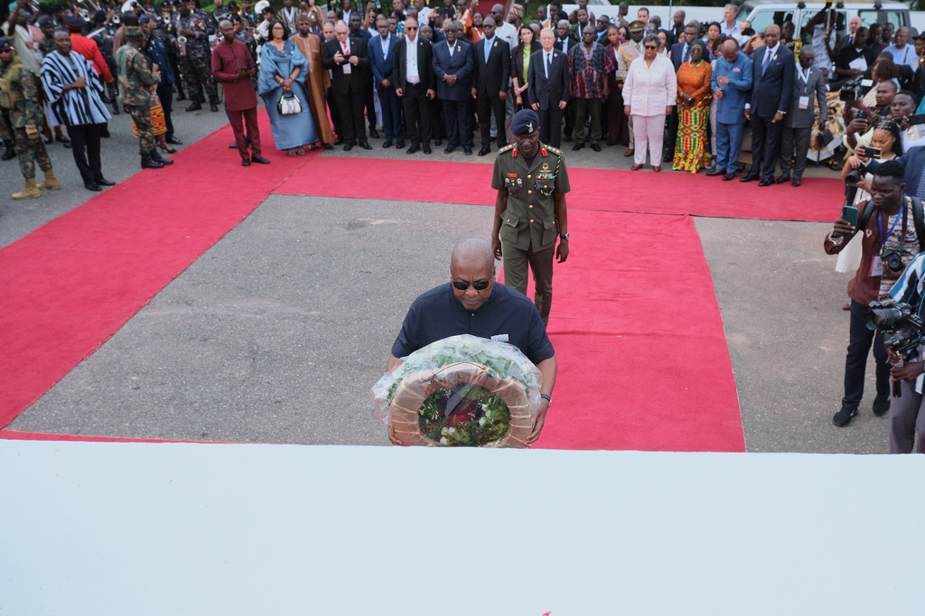 President John Dramani Mahama lays a wreath in a ceremony to honor victims of the transatlantic slave trade at Christiansborg Castle during a Juneteenth commemoration ceremony in Accra, Ghana, Friday, June 19, 2026. (AP Photo/Reuben Ekow Quansah)