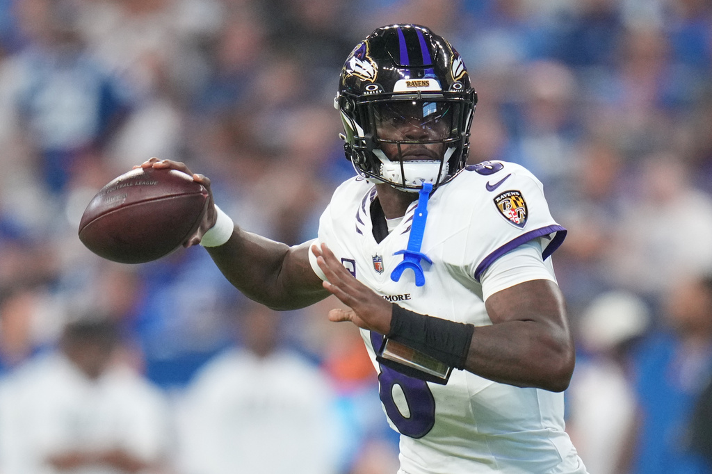 Baltimore Ravens' Lamar Jackson throws during the first half of an NFL football game against the Indianapolis Colts Sunday, Sept. 13, 2026, in Indianapolis. (AP Photo/Jeff Roberson)