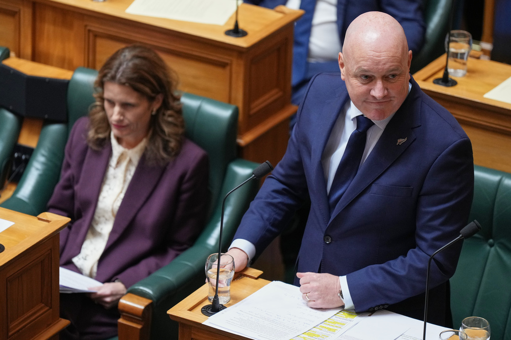 FILE - New Zealand Prime Minister Christopher Luxon speaks during Question Time at Parliament in Wellington, New Zealand, on March 31, 2026. (AP Photo/Charlotte Graham-McLay, File)