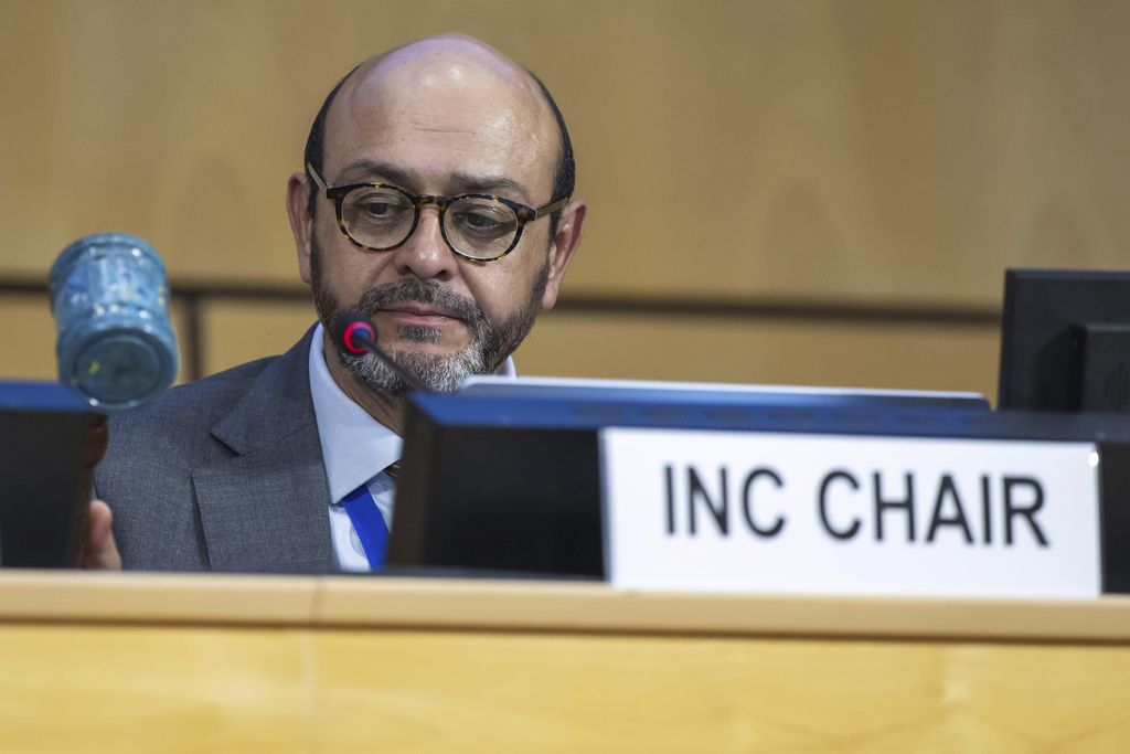 Chair of the International Negotiating Committee Luis Vayas Valdivieso speaks during a plenary session of Second Part of the Fifth Session of the Intergovernmental Negotiating Committee on Plastic Pollution (INC-5.2), at the European headquarters of the United Nations in Geneva, Switzerland, Thursday, Aug. 14, 2025. (Martial Trezzini/Keystone via AP)
