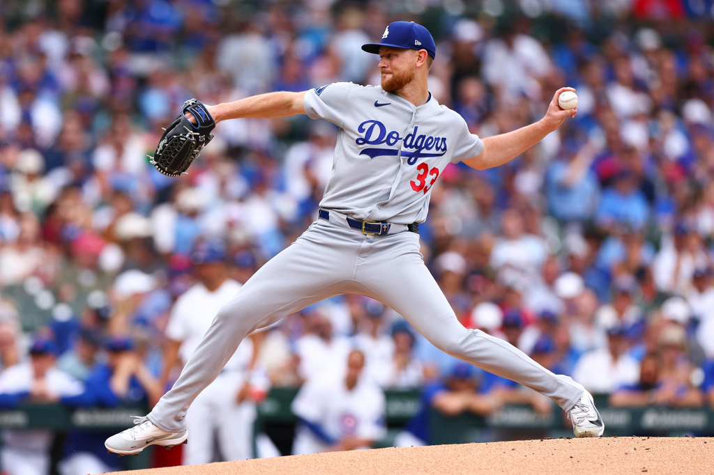 Los Angeles Dodgers pitcher Eric Lauer (33) throws to a Chicago Cubs batter during the first inning of a baseball game in Chicago, Wednesday, Aug. 5, 2026. (AP Photo/Jessie Alcheh)