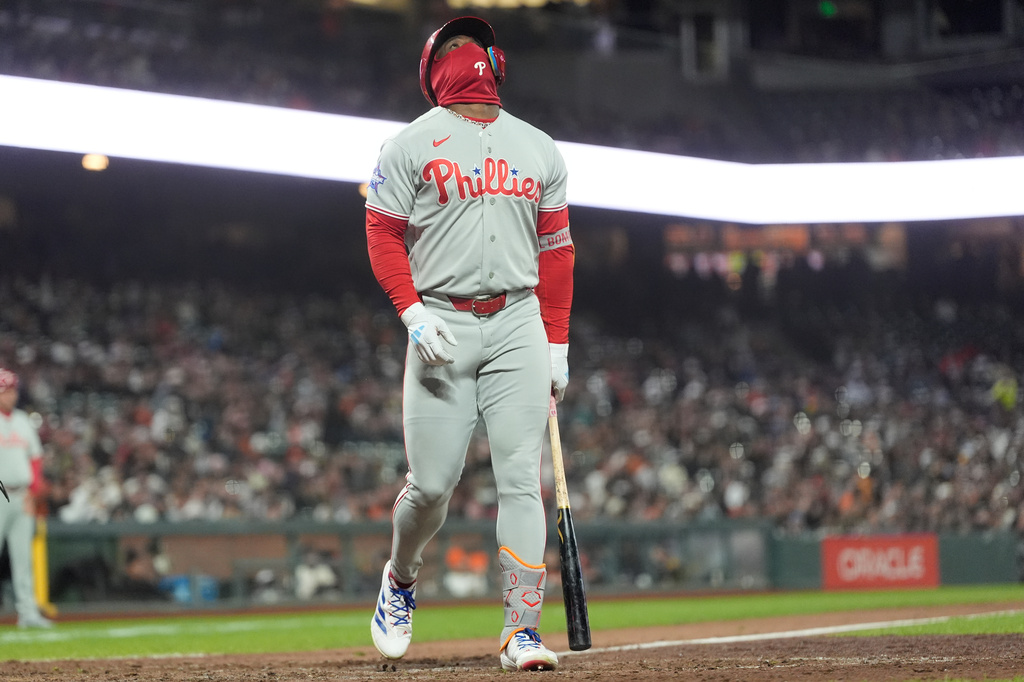 Philadelphia Phillies' Adolis García reacts after striking out against the San Francisco Giants during the eighth inning of a baseball game in San Francisco, Tuesday, April 7, 2026. (AP Photo/Jeff Chiu)