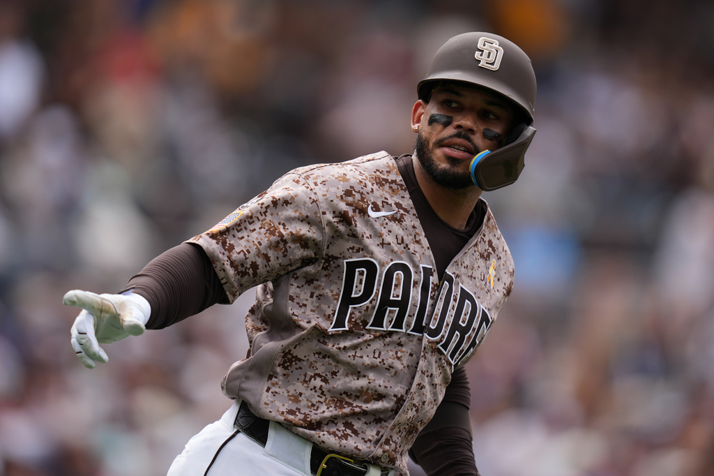 San Diego Padres' Luis Campusano celebrates after hitting a home run during the seventh inning of a baseball game against the New York Yankees Sunday, Sept. 6, 2026, in San Diego. (AP Photo/Gregory Bull)