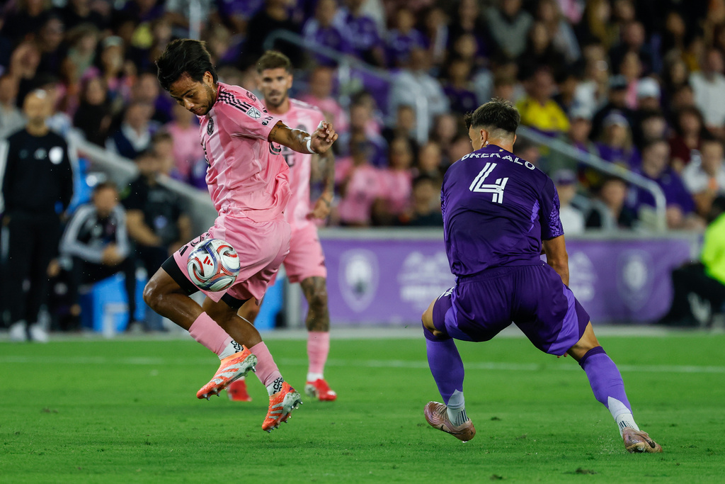 Inter Miami CF midfielder Telasco Segovia, left, stops the ball as he is chased by Orlando City SC defender David Brekalo (4) during the first half of an MLS soccer match, Sunday, March 1, 2026, in Orlando, Fla. (AP Photo/Kevin Kolczynski)