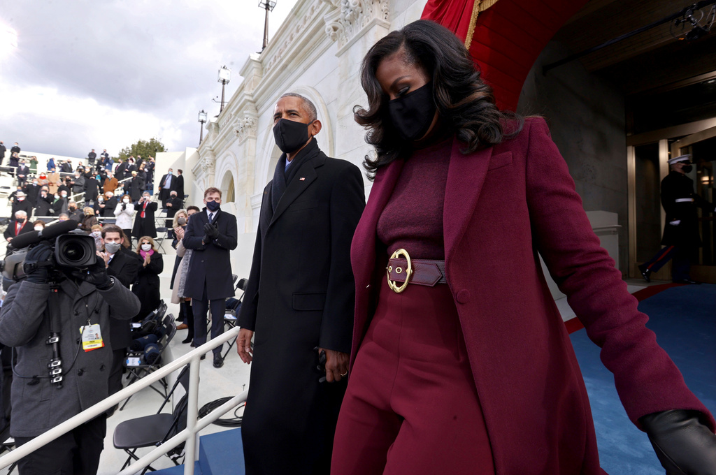 FILE - Former President Barack Obama and former first lady Michelle Obama arrive to attend the 59th Presidential Inauguration at the U.S. Capitol in Washington, Jan. 20, 2021, as Joe Biden was sworn in as the 46th president of the U.S. and Kamala Harris became the first woman vice president. (Jonathan Ernst/Pool Photo via AP, File)