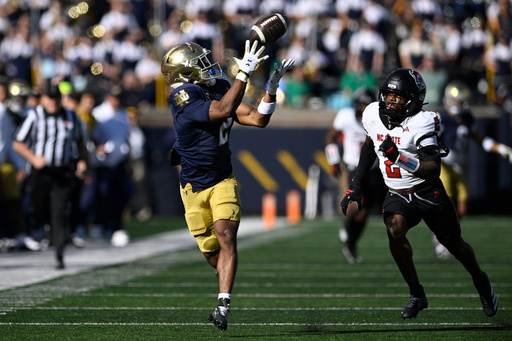 Notre Dame wide receiver Will Pauling, left, catches a pass against North Carolina State's Ronnie Royal lll, right, during the first quarter of an NCAA college football game Saturday, Oct. 11, 2025, in South Bend, Ind. (AP Photo/Paul Beaty) Notre Dame wide receiver Will Pauling, left, catches a pass against North Carolina State's Ronnie Royal lll, right, during the first quarter of an NCAA college football game Saturday, Oct. 11, 2025, in South Bend, Ind. (AP Photo/Paul Beaty)