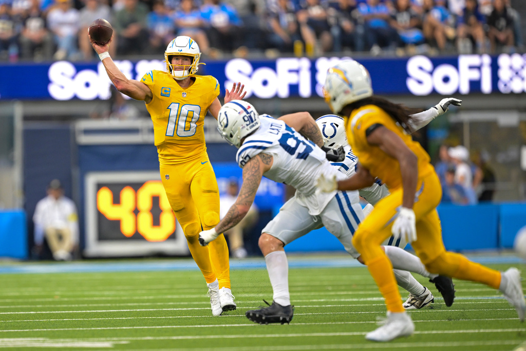 Los Angeles Chargers quarterback Justin Herbert (10) throws against the Indianapolis Colts during the second half of an NFL football game Sunday, Oct. 19, 2025, in Inglewood, Calif. (AP Photo/Carrie Giordano)