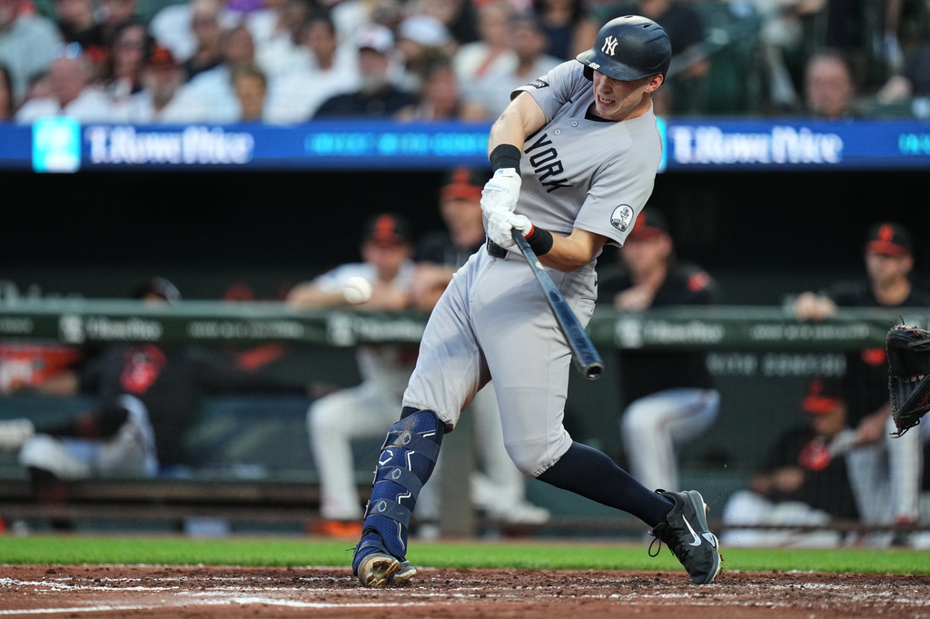New York Yankees' Ben Rice hits a home run during the third inning of a baseball game against the Baltimore Orioles, Wednesday, Aug. 19, 2026, in Baltimore. (AP Photo/Stephanie Scarbrough)