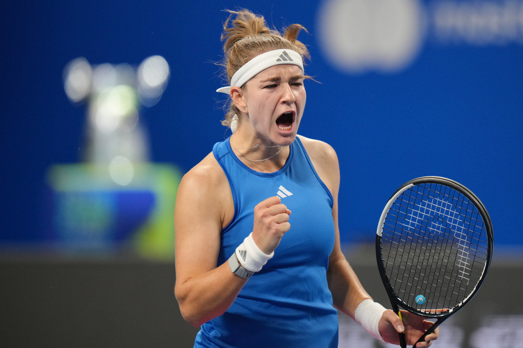 Czech Republic's Karolina Muchova celebrates a point against Spain's Jessica Bouzas Maneiro during the Billie Jean King Cup women's singles semifinal tennis match between Spain and Czech Republic, in Shenzhen, China, Friday, Sept. 25, 2026. (AP Photo/Andy Wong)