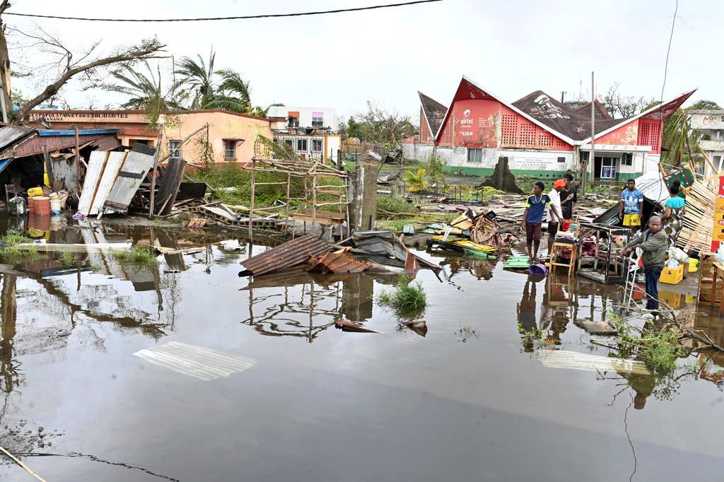 People survey the damage done by cyclone Gezani in Toamasina, Madagascar, Wednesday, Feb. 11, 2026. (AP Photo/Hery Nirina Rabary)