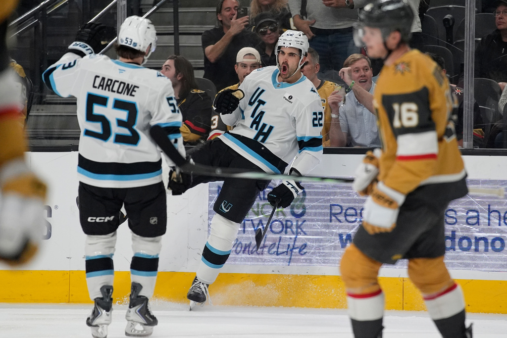 Utah Mammoth center Jack McBain (22) celebrates after scoring against the Vegas Golden Knights during the first period of an NHL hockey game Thursday, March 19, 2026, in Las Vegas. (AP Photo/John Locher)
