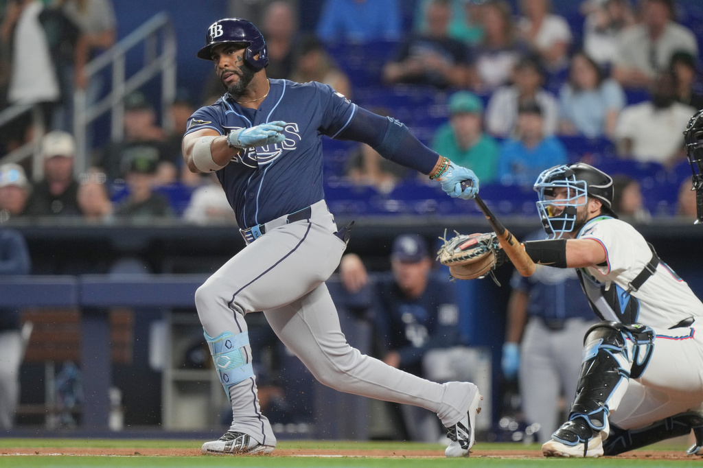 Tampa Bay Rays' Yandy Díaz strikes out during the first inning of a baseball game against the Miami Marlins Saturday, June 6, 2026, in Miami. (AP Photo/Marta Lavandier)