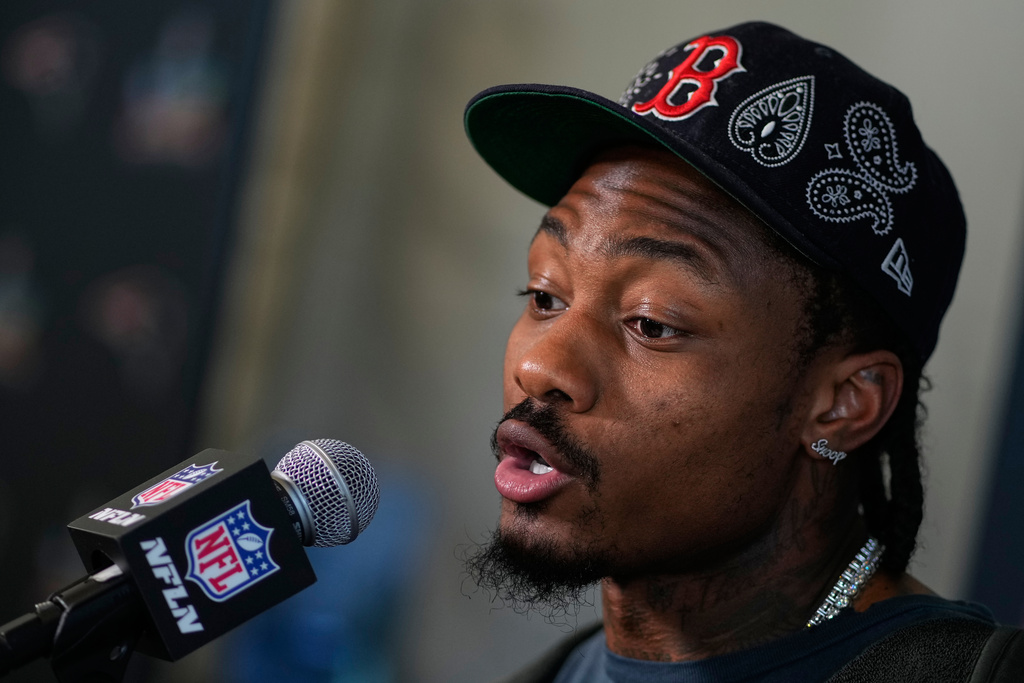 New England Patriots wide receiver Stefon Diggs talks to the media during a news conference Thursday, Feb. 5, 2026, in Santa Clara, Calif., ahead of the Super Bowl 60 NFL football game between the New England Patriots and the Seattle Seahawks. (AP Photo/Charlie Riedel)