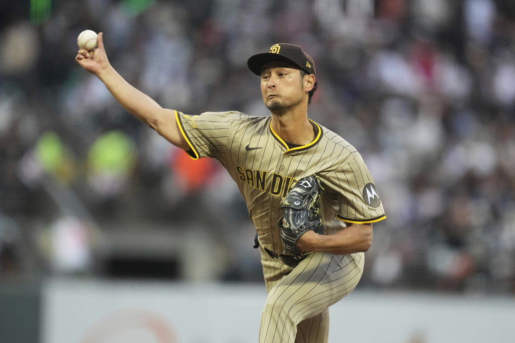 San Diego Padres pitcher Yu Darvish throws against the San Francisco Giants during the third inning of a baseball game in San Francisco, Monday, Aug. 11, 2025. (AP Photo/Jeff Chiu)