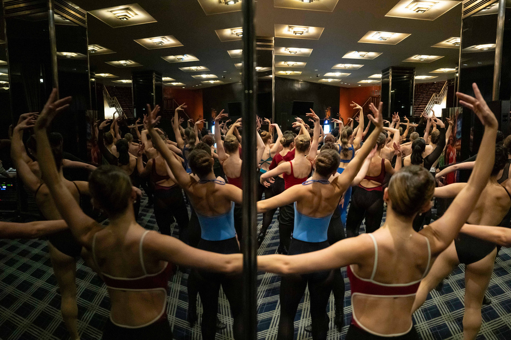 Dancers rehearse choreography before an audition for the Radio City Rockettes at Radio City Music Hall in New York, on Wednesday, April 22, 2026. (AP Photo/Yuki Iwamura)
