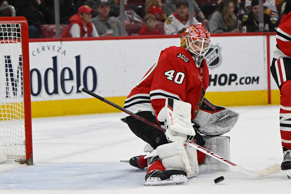 Chicago Blackhawks goalie Arvid Soderblom (40) makes a save during the second period of an NHL hockey game against the Vancouver Canucks in Chicago, Friday, March 6, 2026. (AP Photo/Paul Beaty)