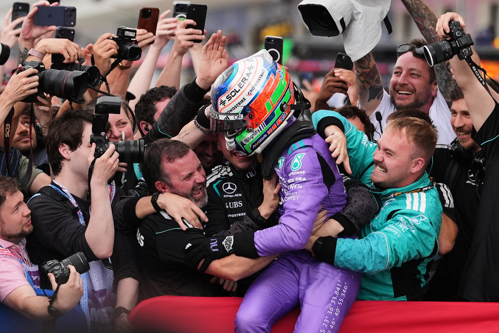 Mercedes driver Kimi Antonelli of Italy celebrates after winning the Miami Formula One Grand Prix auto race, Sunday, May 3, 2026, in Miami Gardens, Fla. (AP Photo/Rebecca Blackwell)