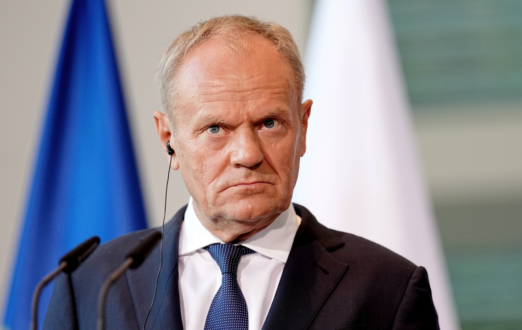 FILE - Polish Prime Minister Donald Tusk looks on during a press conference during the E5 summit of leading European nations ahead of the upcoming NATO summit, in Berlin, Wednesday June 24, 2026. (Kay Nietfeld/dpa via AP,File)