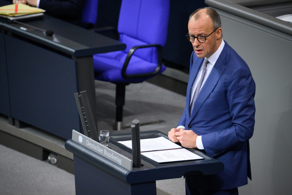 German Chancellor Friedrich Merz makes a government statement on the current foreign policy situation in the 56th plenary session of the 21st legislative period in the German Bundestag, in Berlin, Thursday Jan. 29, 2026. (Bernd von Jutrczenka/dpa via AP)