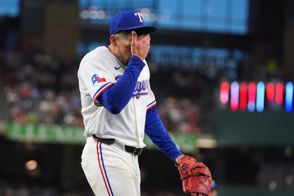 Texas Rangers starting pitcher Nathan Eovaldi comes off the field after the fifth inning of a baseball game against the Detroit Tigers, Thursday, July 2, 2026, in Arlington, Texas. (AP Photo/LM Otero)