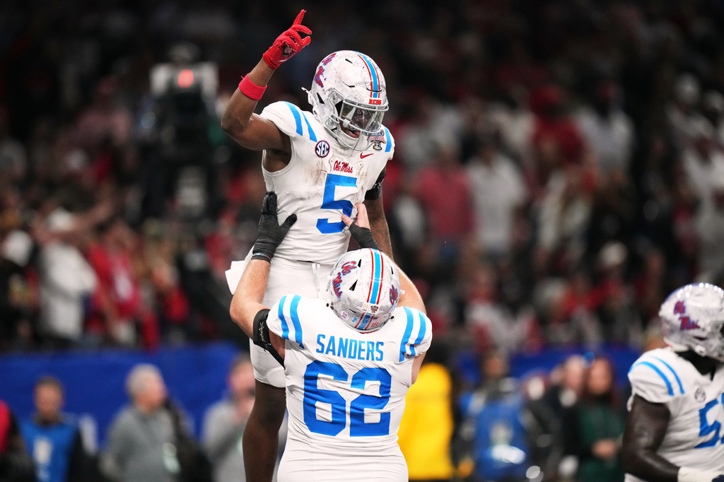 FILE - Mississippi running back Kewan Lacy (5) celebrates his touchdown in the second half of the Sugar Bowl NCAA college football playoff quarterfinal game against Georgia in New Orleans, Jan. 1, 2026. (AP Photo/Mathew Hinton, File)