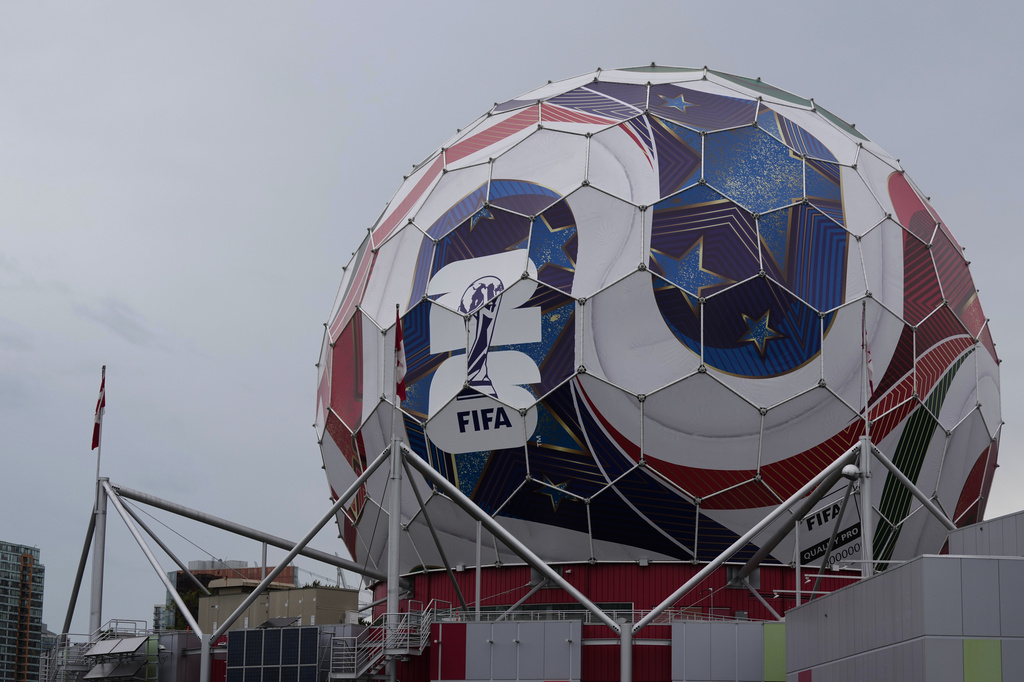 A giant FIFA World Cup match ball is displayed at Science World, Thursday, June 25, 2026 in Vancouver, British Columbia. (AP Photo/Abbie Parr)