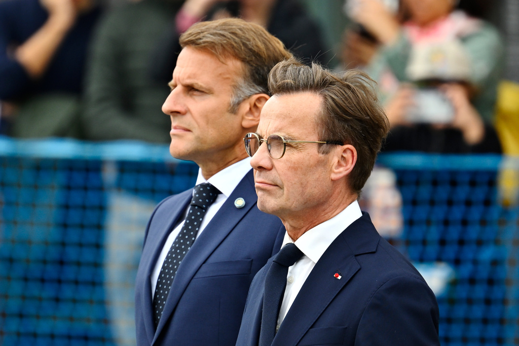 French President Emmanuel Macron, left, is welcomed by Swedish Prime Minister Ulf Kristersson, in Stockholm, Sweden, Monday, Aug. 31, 2026. (Anders Wiklund /TT News Agency via AP)
