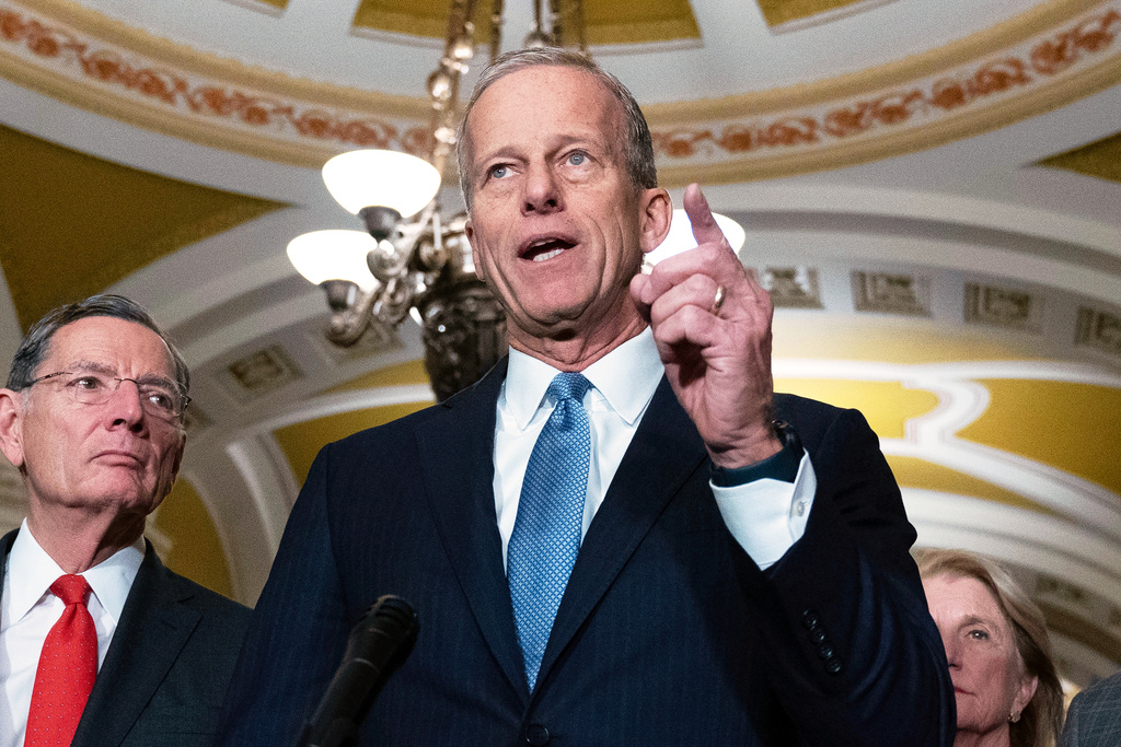 Senate Majority Leader John Thune, R-S.D., speaks to reporters following the weekly policy luncheons at the Capitol, Tuesday, Dec. 16, 2025, in Washington. (AP Photo/Jose Luis Magana)