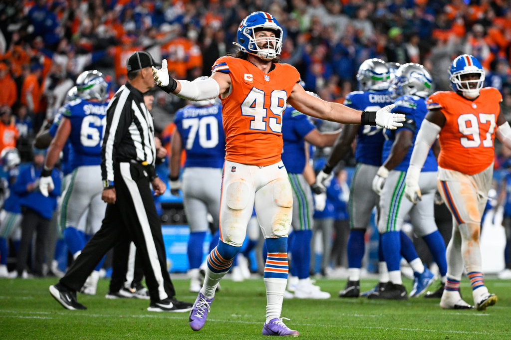Denver Broncos inside linebacker Alex Singleton (49) reacts after a field goal attempt by Seattle Seahawks place-kicker Jason Myers was no good during the second half of an NFL football game in Denver, Thursday, Oct. 15, 2026. (AP Photo/Geneva Heffernan)