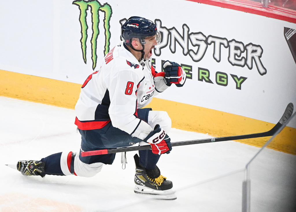 Washington Capitals' Alex Ovechkin (8) reacts after scoring on the Montreal Canadiens during the first period of an NHL hockey game in Montreal, Saturday, Feb. 28, 2026. (Graham Hughes/The Canadian Press via AP)